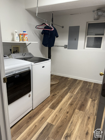 175 North 160 East Hurricane, UT 84737 - Photo 31 of 43 Laundry area featuring electric panel, light wood-type flooring, and washing machine and dryer