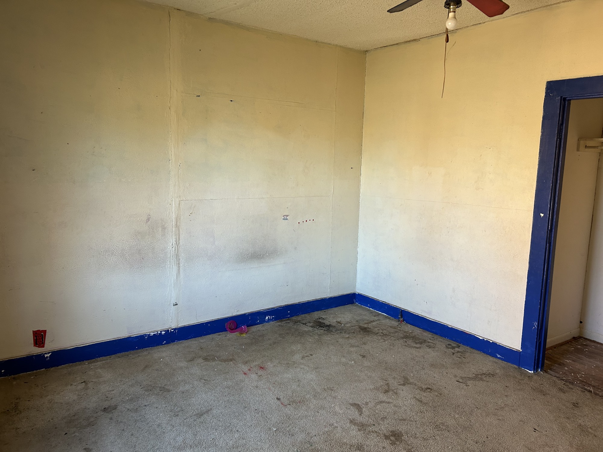 903 West 8th Street Quanah, TX 79252 - Photo 13 of 15 a view of an empty room