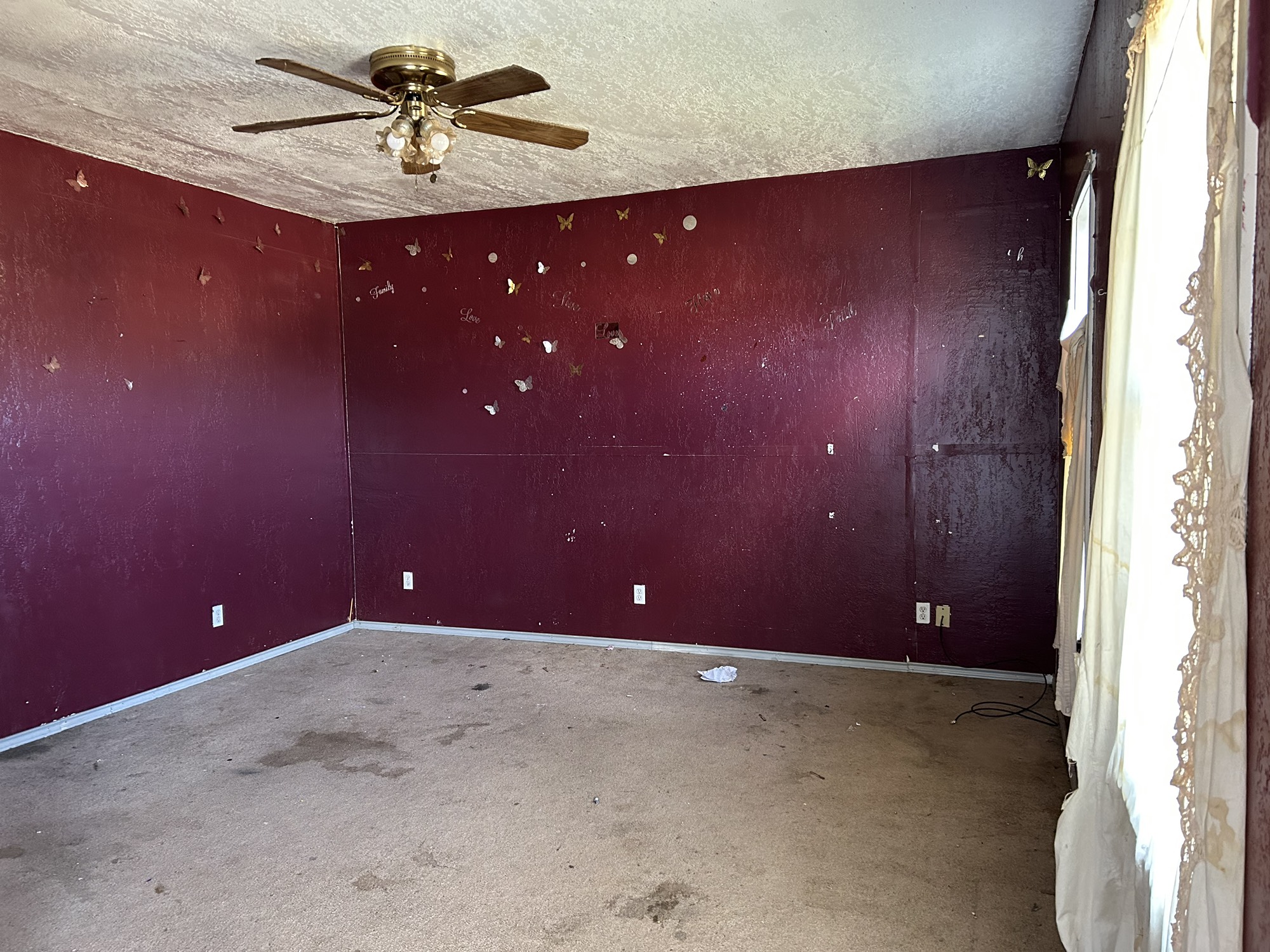 903 West 8th Street Quanah, TX 79252 - Photo 8 of 15 a view of an empty room