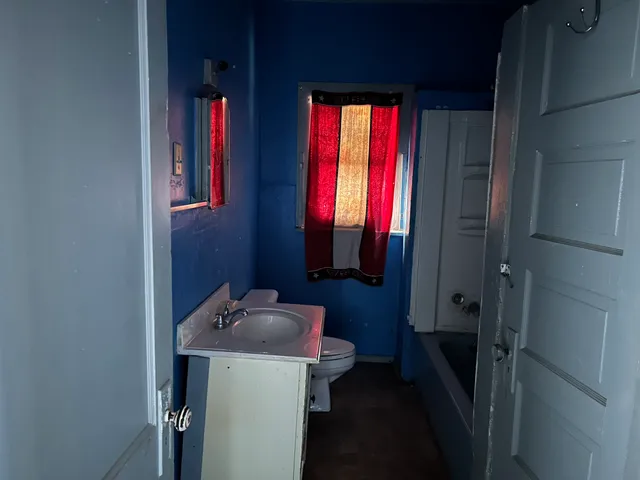 a bathroom with a sink and a bathtub