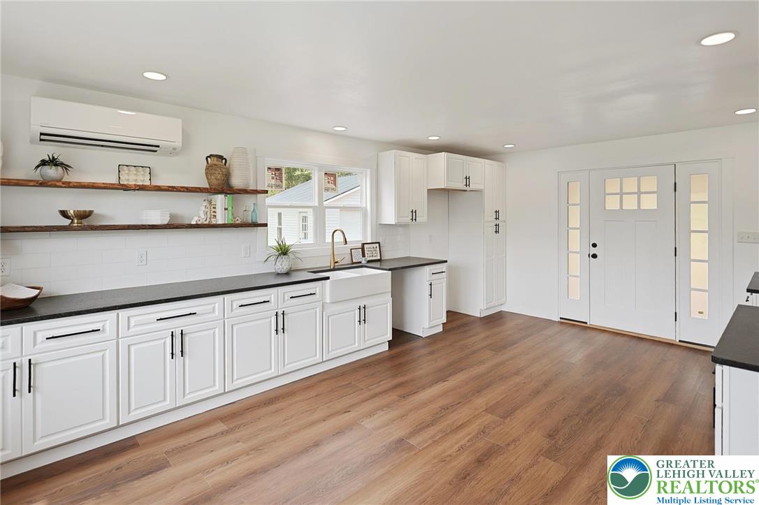 121 Ben Titus Road Tamaqua, PA 18252 - Photo 16 of 48 a kitchen with a sink cabinets and wooden floor