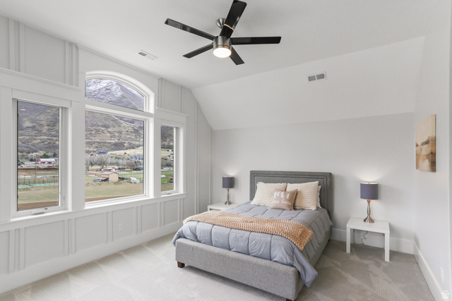1354 South 800 East Mapleton, UT 84664 - Photo 63 of 129 Bedroom with vaulted ceiling, ceiling fan, a decorative wall, and light carpet