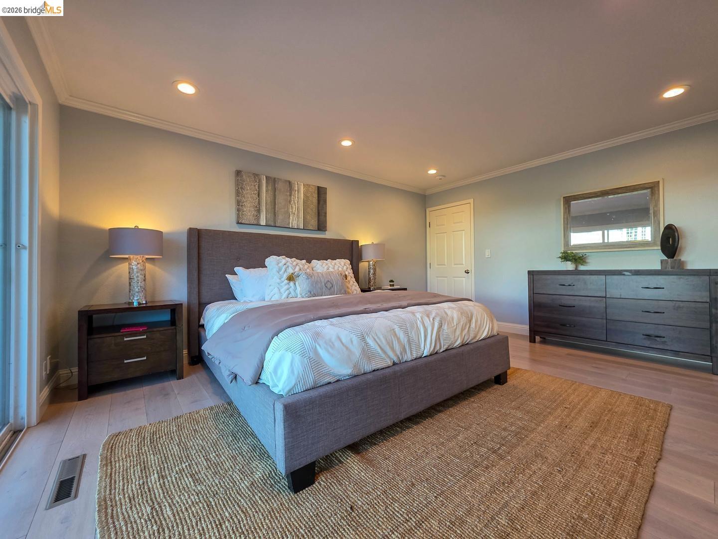 965 Springer Road Los Altos, CA 94024 - Photo 28 of 31 Bedroom featuring light wood-finish flooring, recessed lighting, and crown molding