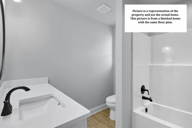 a bathroom with a sink and a bathtub