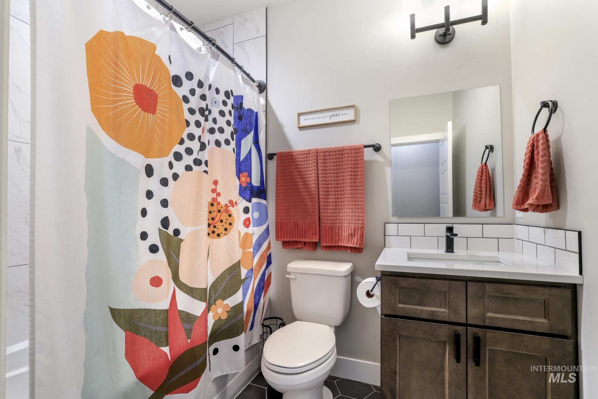 3103 Moonrise Road Twin Falls, ID 83301 - Photo 22 of 40 Full bath featuring vanity and a shower with curtain