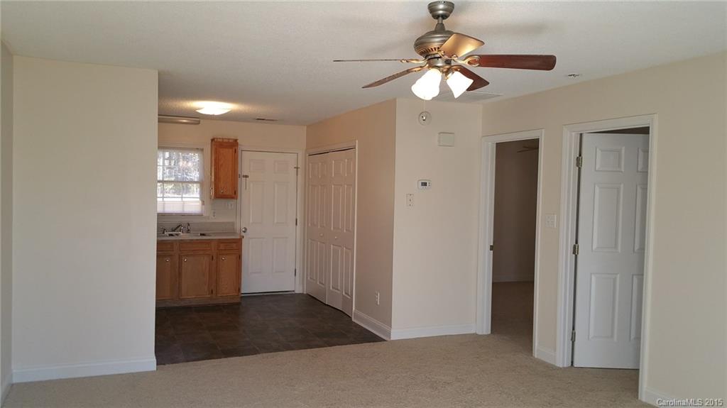 2294 Beth Haven Church Road, Unit 2294 Denver, NC 28037 - Photo 3 of 11 a view of an empty room and kitchen view