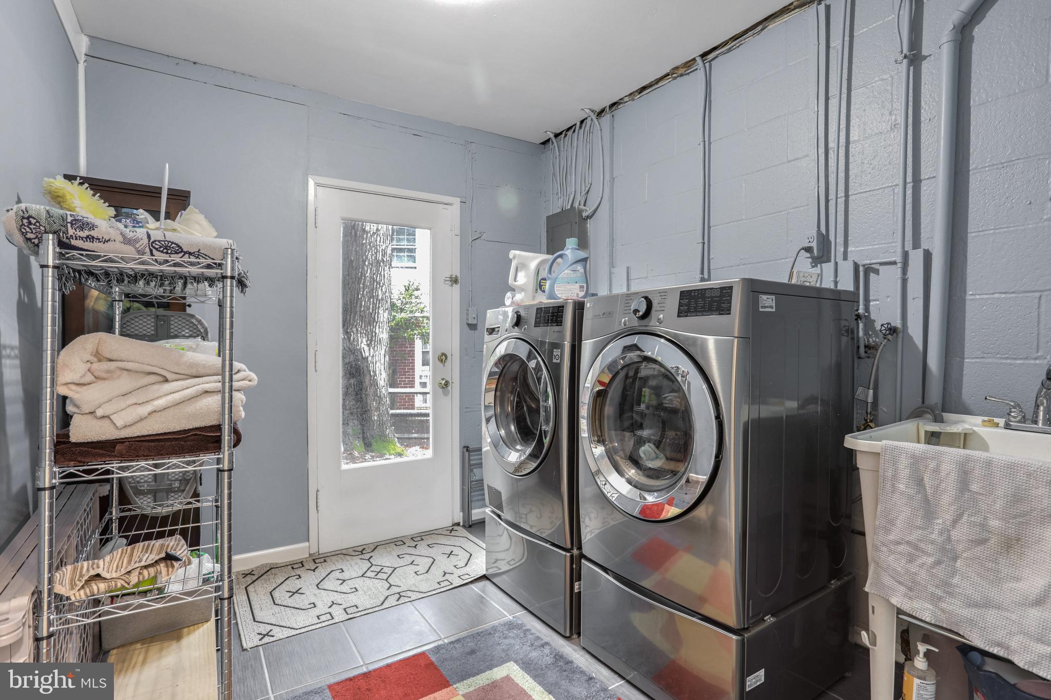 10914 Hunt Club Road Reston, VA 20190 - Photo 26 of 44 a utility room with dryer and washer