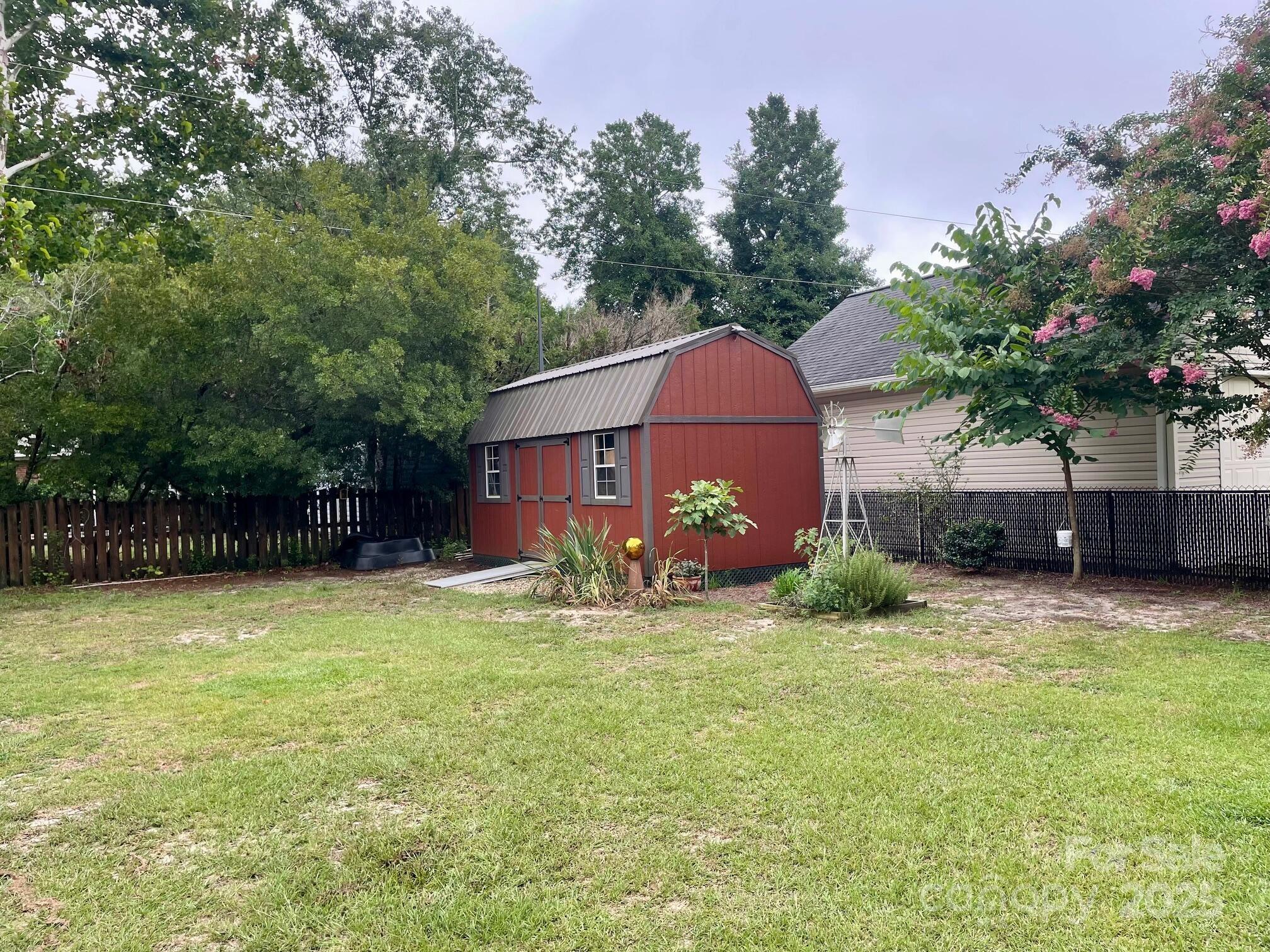 417 Oxford Road Lexington, SC 29072 - Photo 23 of 27 a view of a house with a yard and a tree