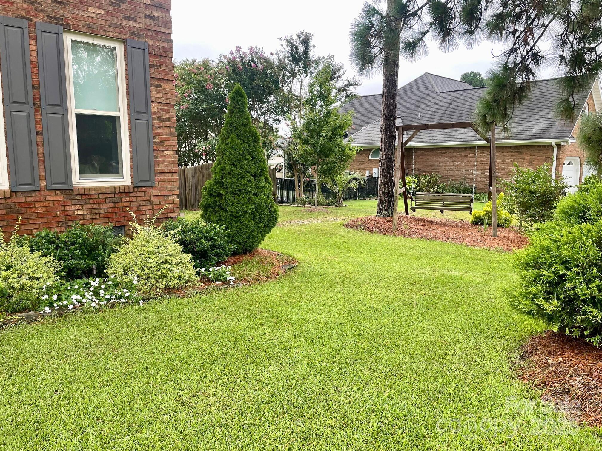 417 Oxford Road Lexington, SC 29072 - Photo 3 of 27 a view of a backyard with a garden and plants