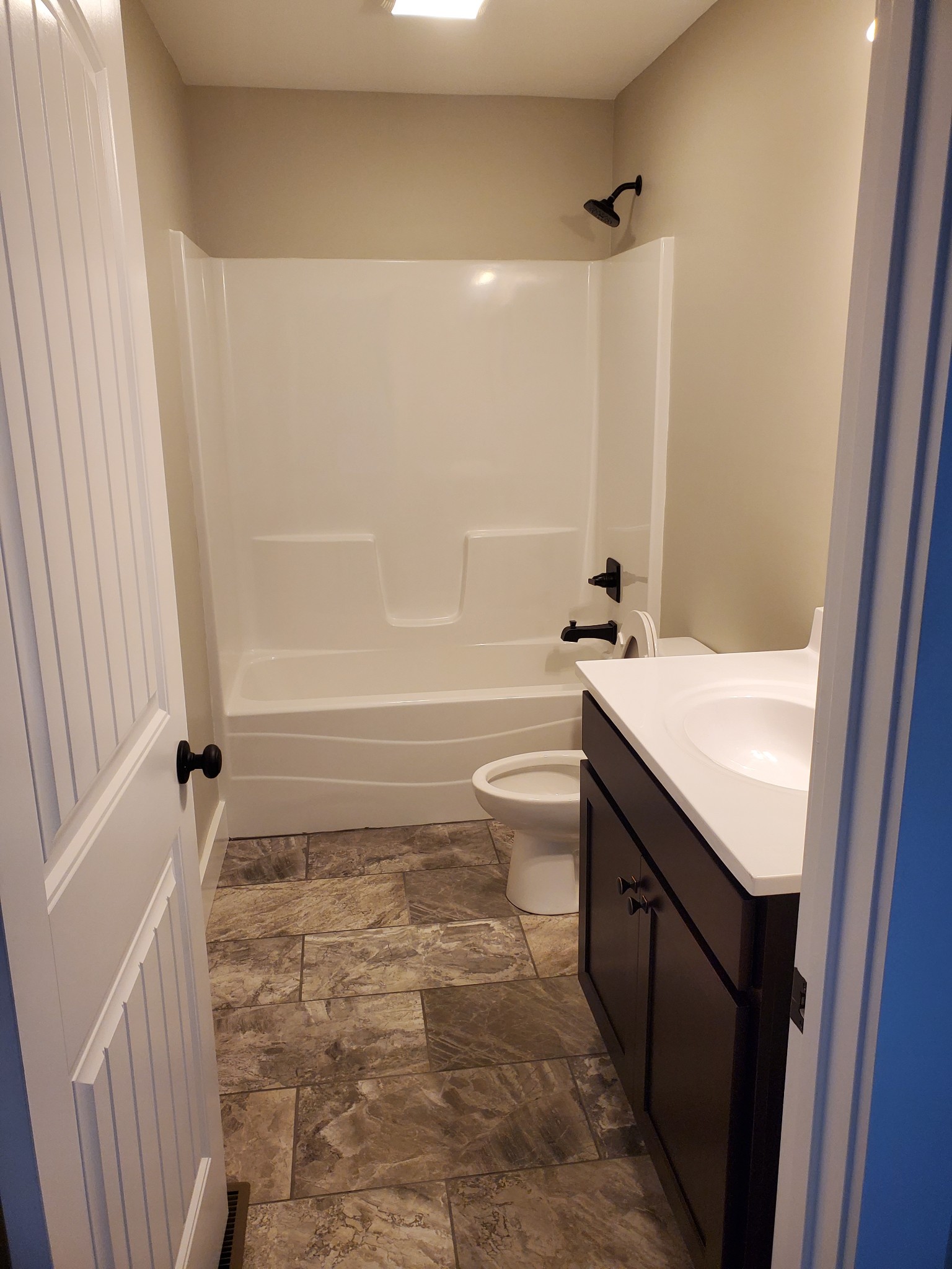 155 Bellwood Road Lebanon, TN 37087 - Photo 14 of 16 a bathroom with a sink a toilet and shower