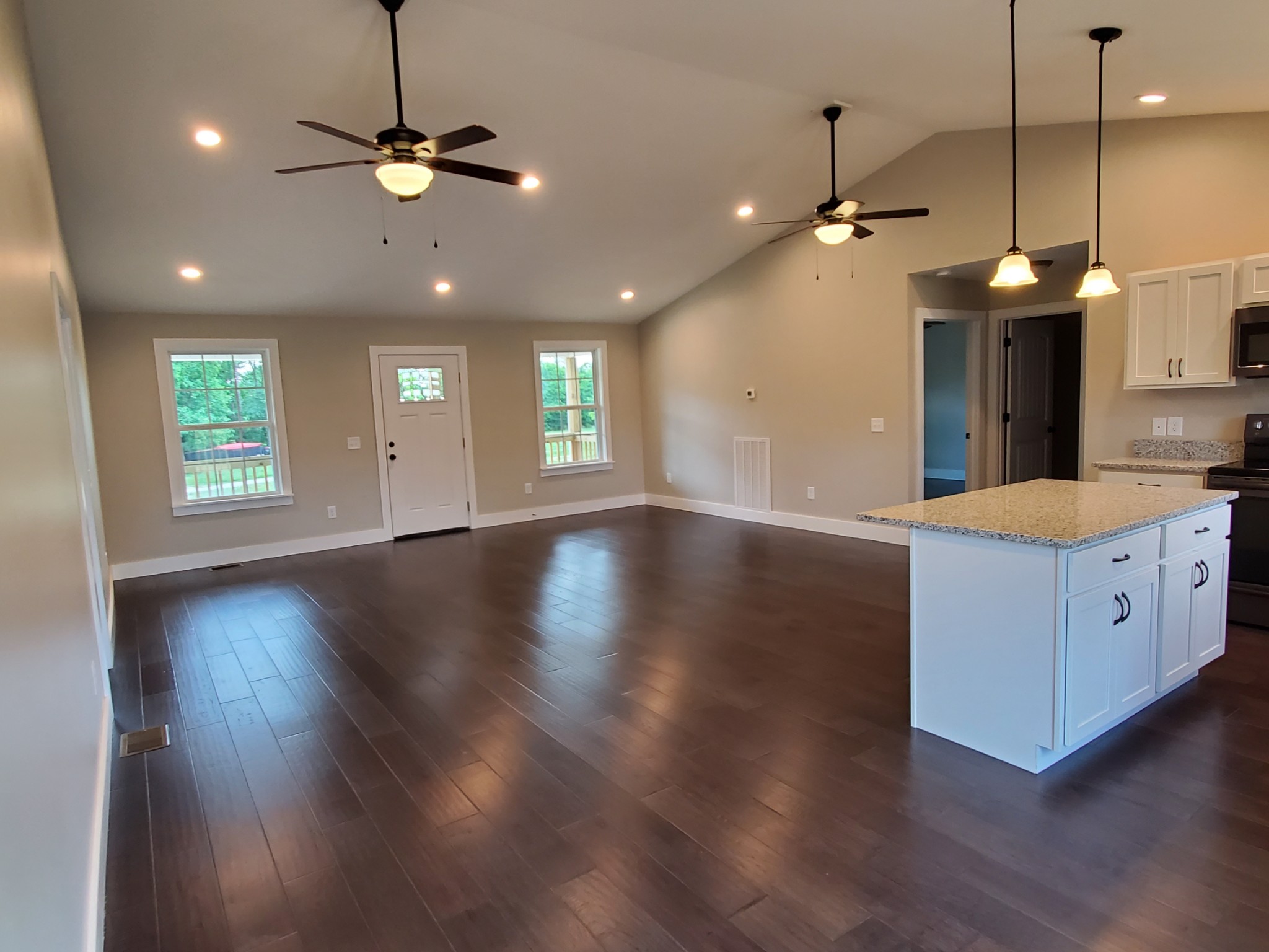 155 Bellwood Road Lebanon, TN 37087 - Photo 6 of 16 a view of an empty room with window and wooden floor