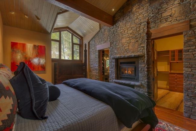 91 Winding Creek Road Olympic Valley, CA 96146 - Photo 9 of 14 a bedroom with a bed and a flat screen tv