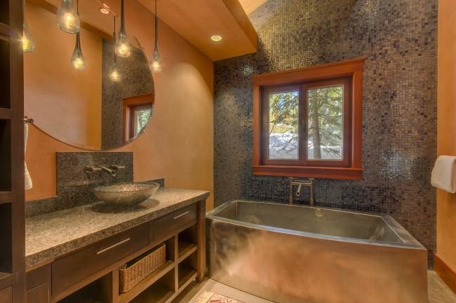 91 Winding Creek Road Olympic Valley, CA 96146 - Photo 10 of 14 a bathroom with a sink a large mirror and a bathtub