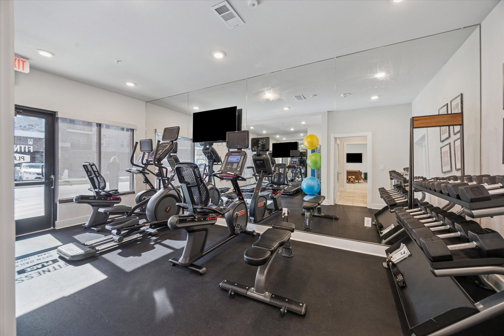 6804 Westview Drive, Unit 2205 Houston, TX 77055 - Photo 15 of 23 The state-of-the-art fitness center offers residents a professional-grade workout environment equipped with premium cardio machines, free weights, and strength-training stations.
