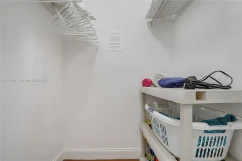 a bathroom with a sink and a shower curtain