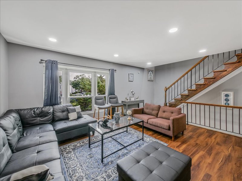 1968 Holbrook Lane Hoffman Estates, IL 60169 - Photo 12 of 31 a living room with furniture and a large window