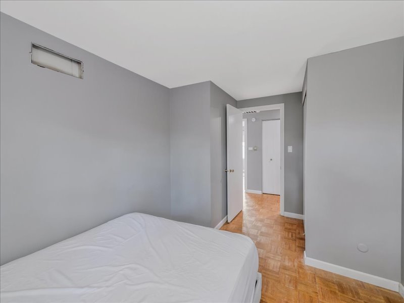 1968 Holbrook Lane Hoffman Estates, IL 60169 - Photo 20 of 31 a bedroom with a bed and hallway