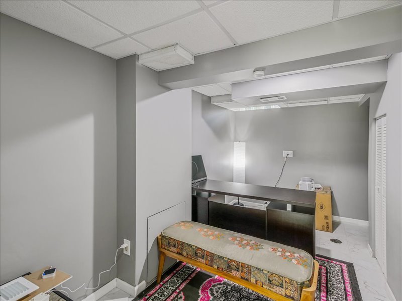 1968 Holbrook Lane Hoffman Estates, IL 60169 - Photo 7 of 31 a living room with a bed and furniture