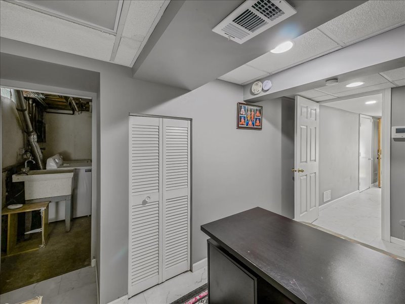 1968 Holbrook Lane Hoffman Estates, IL 60169 - Photo 8 of 31 a view of a hallway to closet and wooden floor