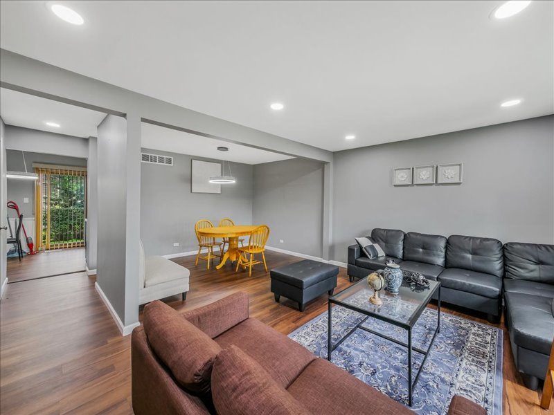 1968 Holbrook Lane Hoffman Estates, IL 60169 - Photo 10 of 31 a living room with furniture and wooden floor