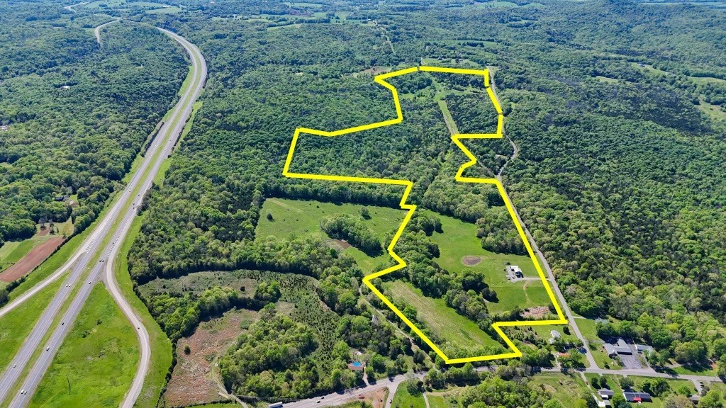 9147 Spantown Road Arrington, TN 37014 - Photo 2 of 15 a aerial view of a yard
