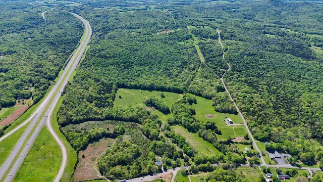 a view of a golf course with a garden