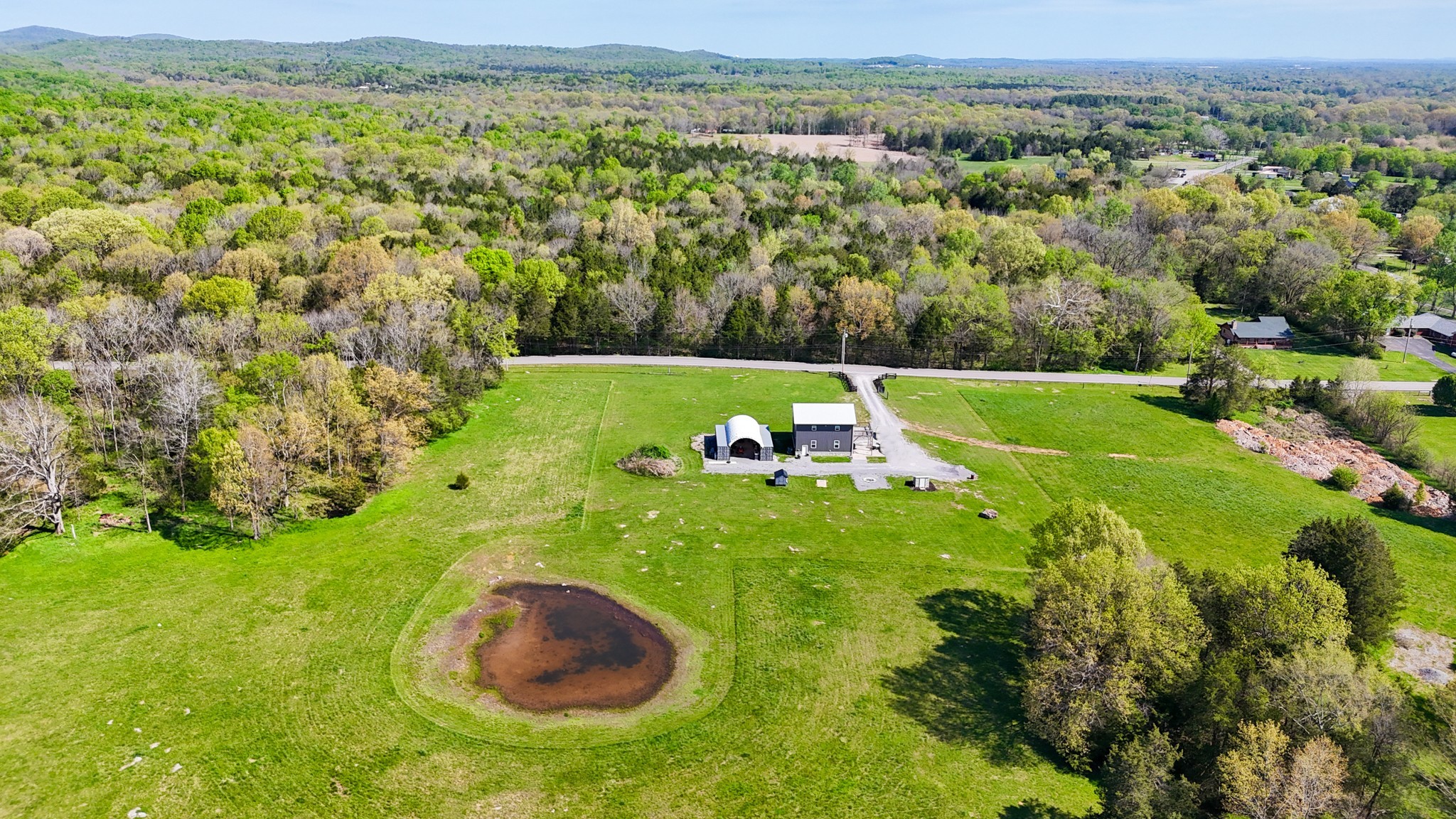 9147 Spantown Road Arrington, TN 37014 - Photo 4 of 15 a view of a golf course with a garden