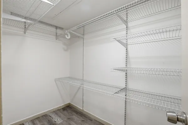 a view of a room with racks on the wall