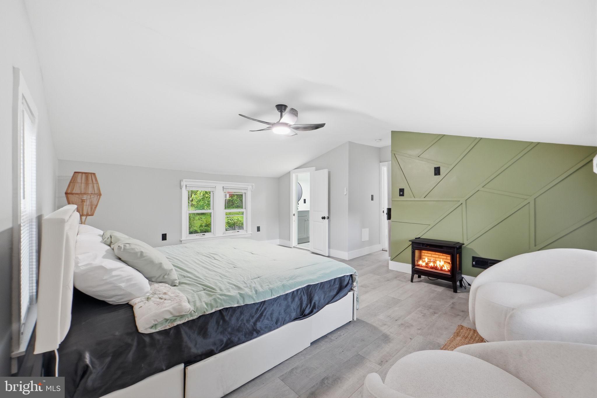 5906 Berwyn Road College Park, MD 20740 - Photo 13 of 46 a bedroom with bed and window