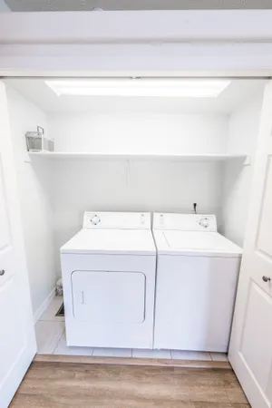 a utility room with dryer and washer