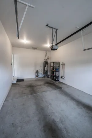 a view of empty room with wooden ceiling