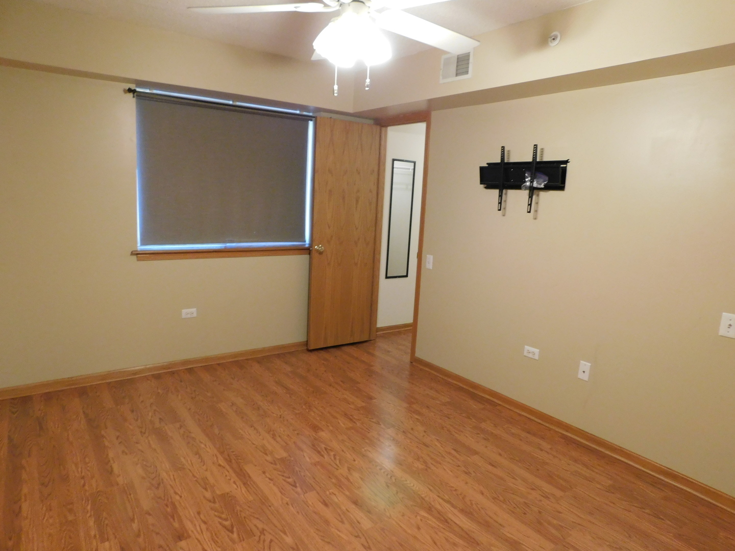 18100 Rita Road, Unit 1B Tinley Park, IL 60477 - Photo 17 of 24 a view of an empty room with a window