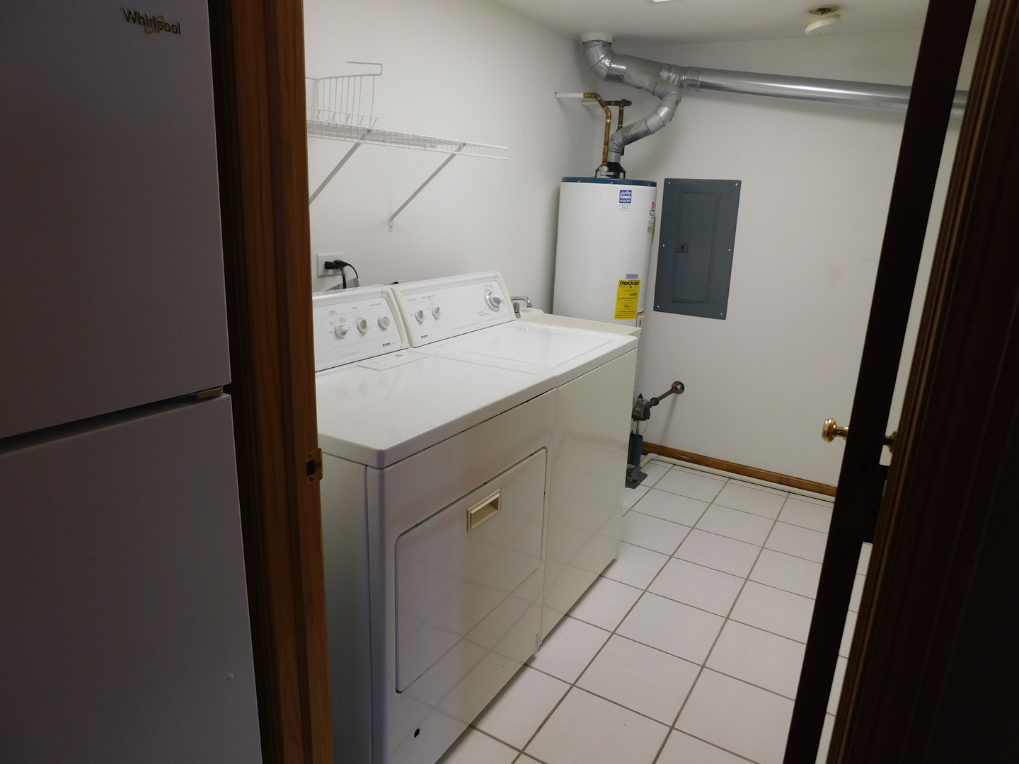 18100 Rita Road, Unit 1B Tinley Park, IL 60477 - Photo 23 of 24 a utility room with dryer and washer