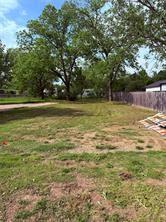 721 East Bullock Street Denison, TX 75021 - Photo 2 of 3 a view of a lake view