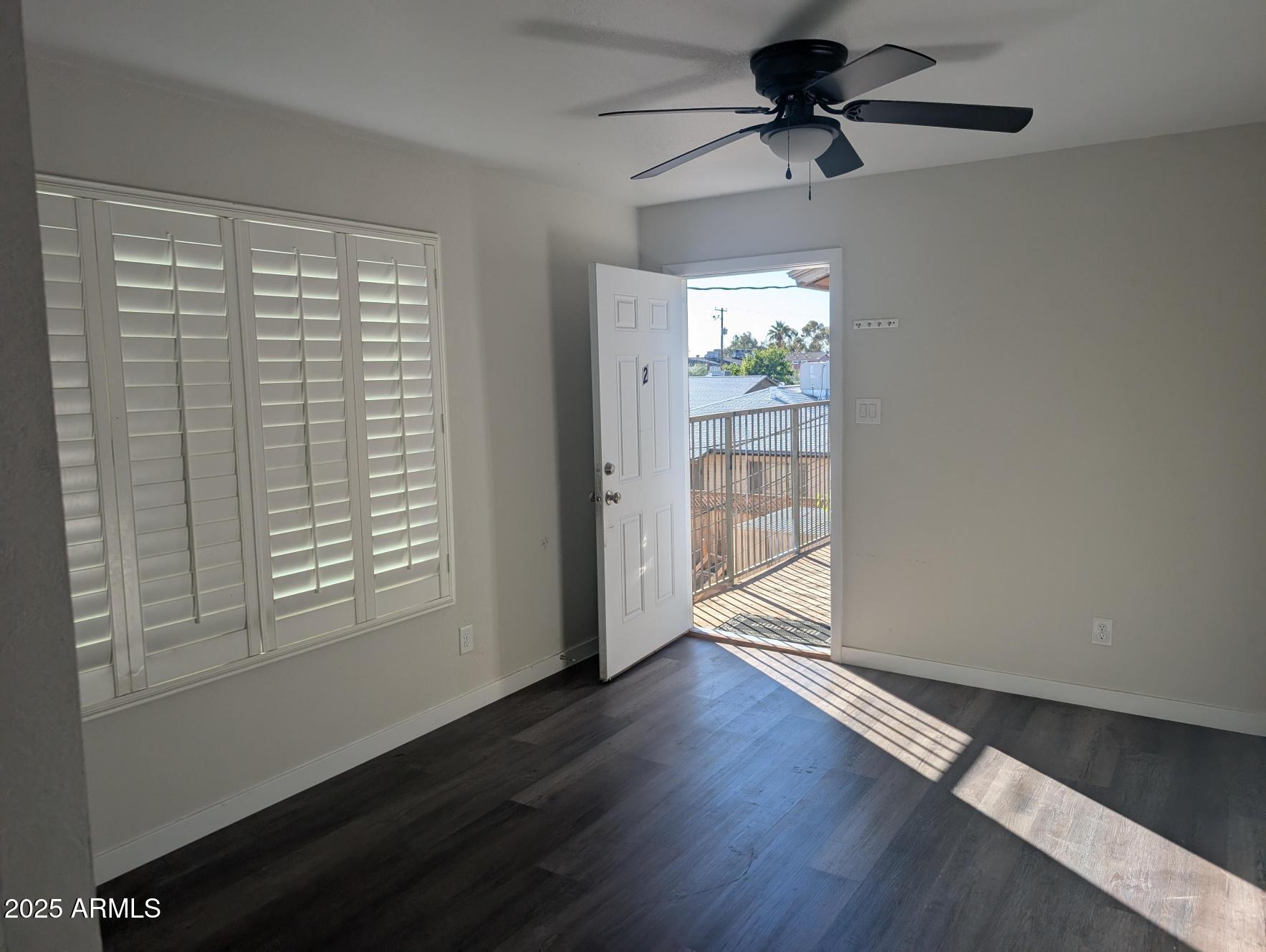7160 North 53rd Avenue, Unit 2 Glendale, AZ 85301 - Photo 12 of 20 a view of an empty room with a window