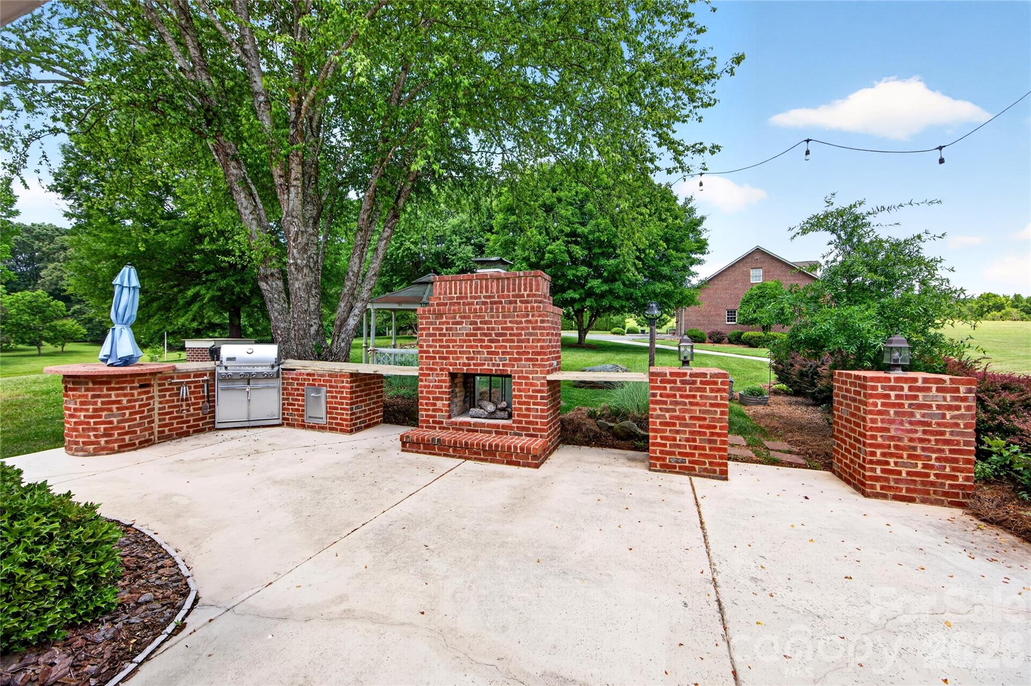 40659 Ridenhour Road Richfield, NC 28137 - Photo 21 of 25 a view of a chairs and table in the patio