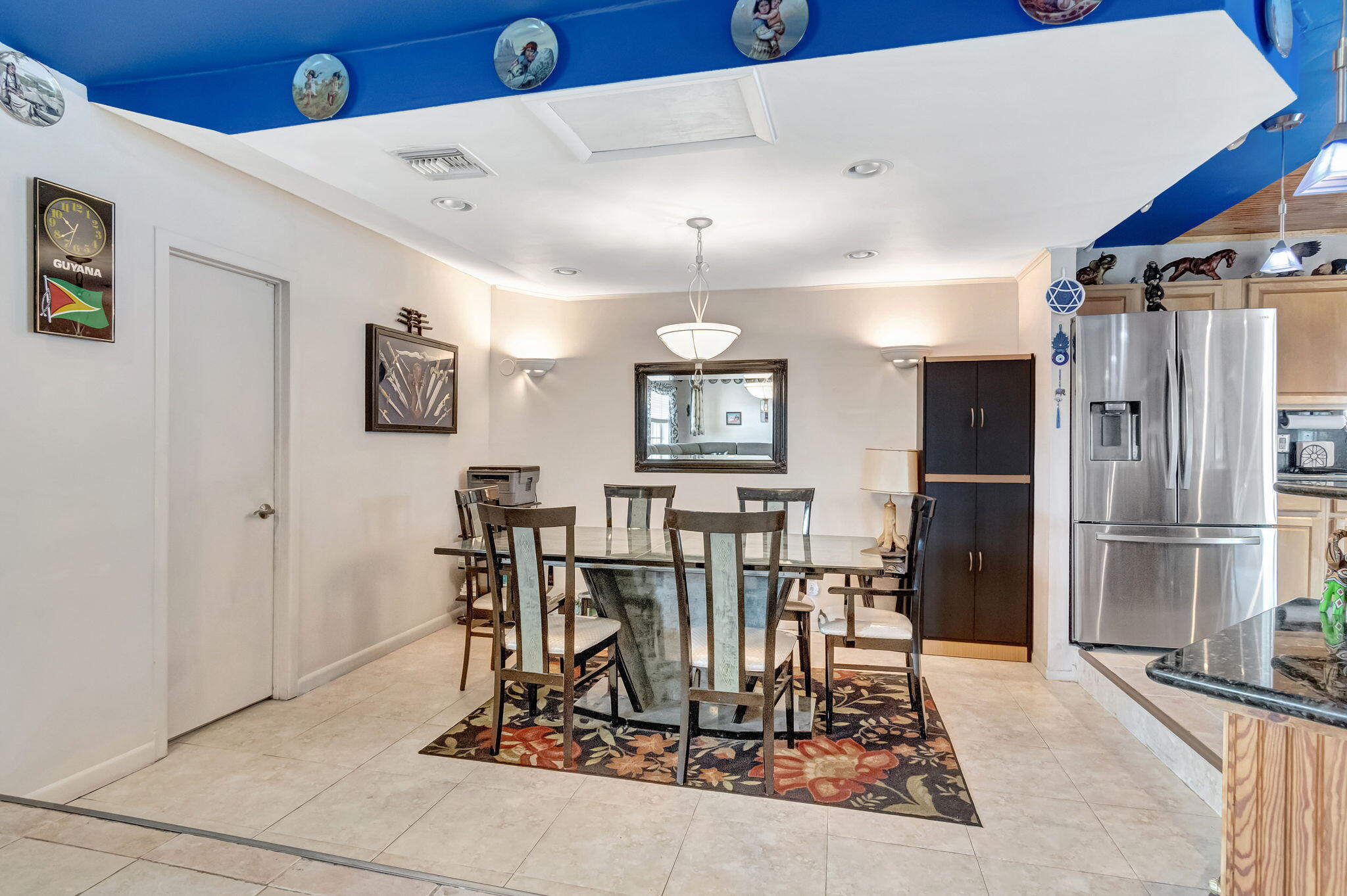 4557 Avalon Street Boca Raton, FL 33428 - Photo 12 of 47 a view of a dining room with furniture