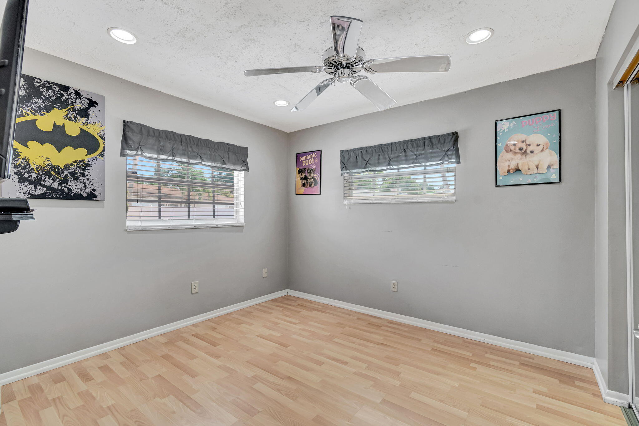 4557 Avalon Street Boca Raton, FL 33428 - Photo 25 of 47 a view of room with window and ceiling fan