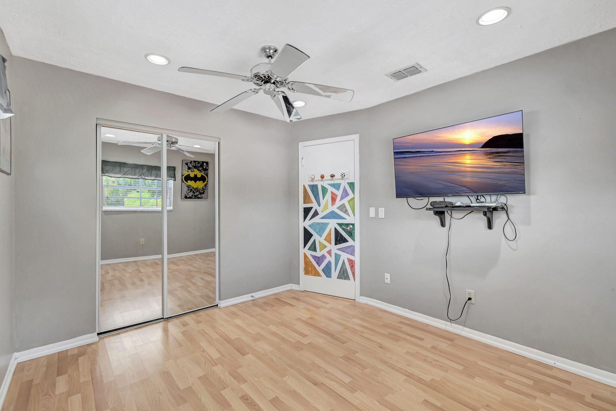 4557 Avalon Street Boca Raton, FL 33428 - Photo 27 of 47 a view of room window and a ceiling fan
