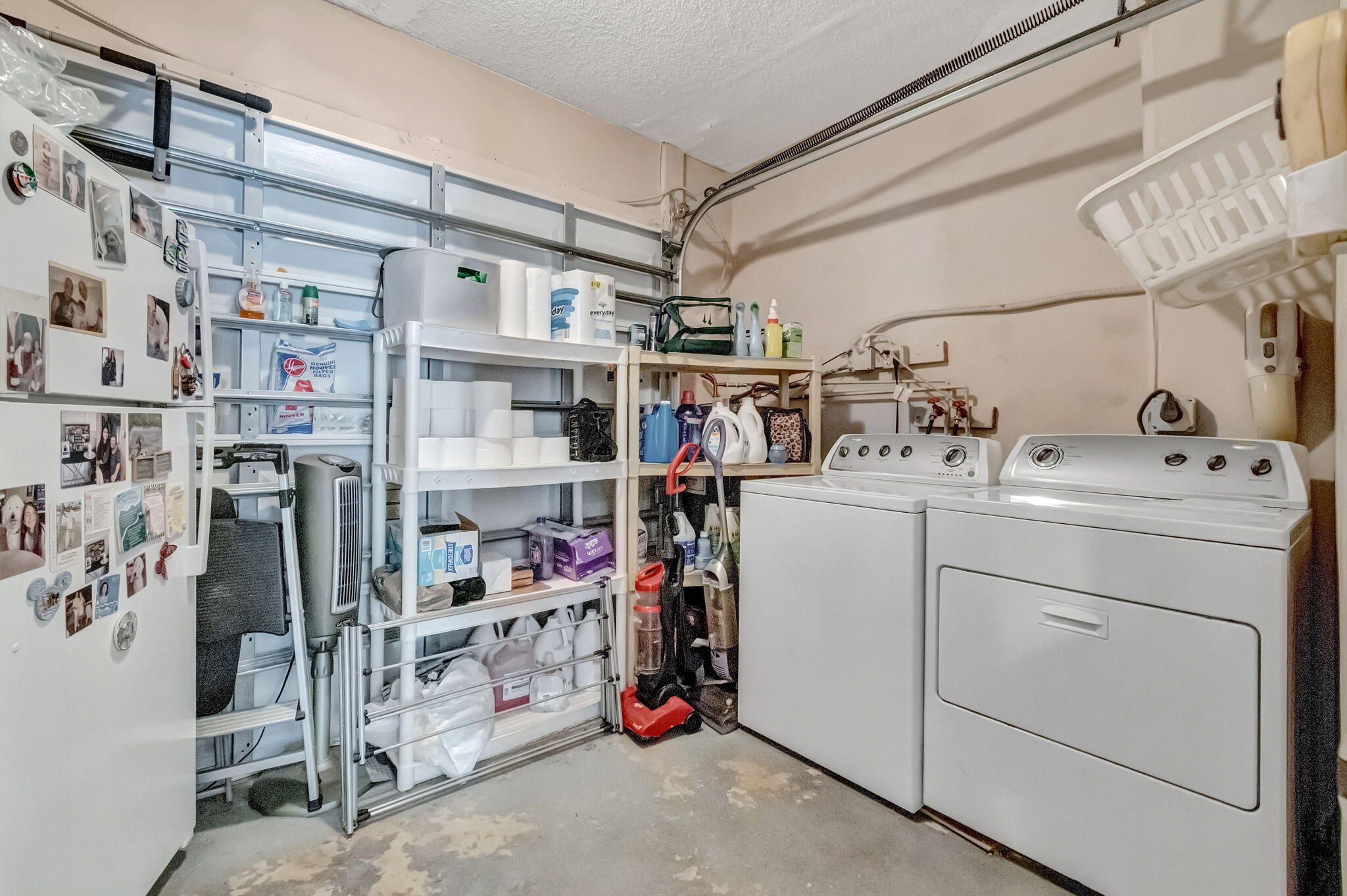 4557 Avalon Street Boca Raton, FL 33428 - Photo 32 of 47 a utility room with cabinets