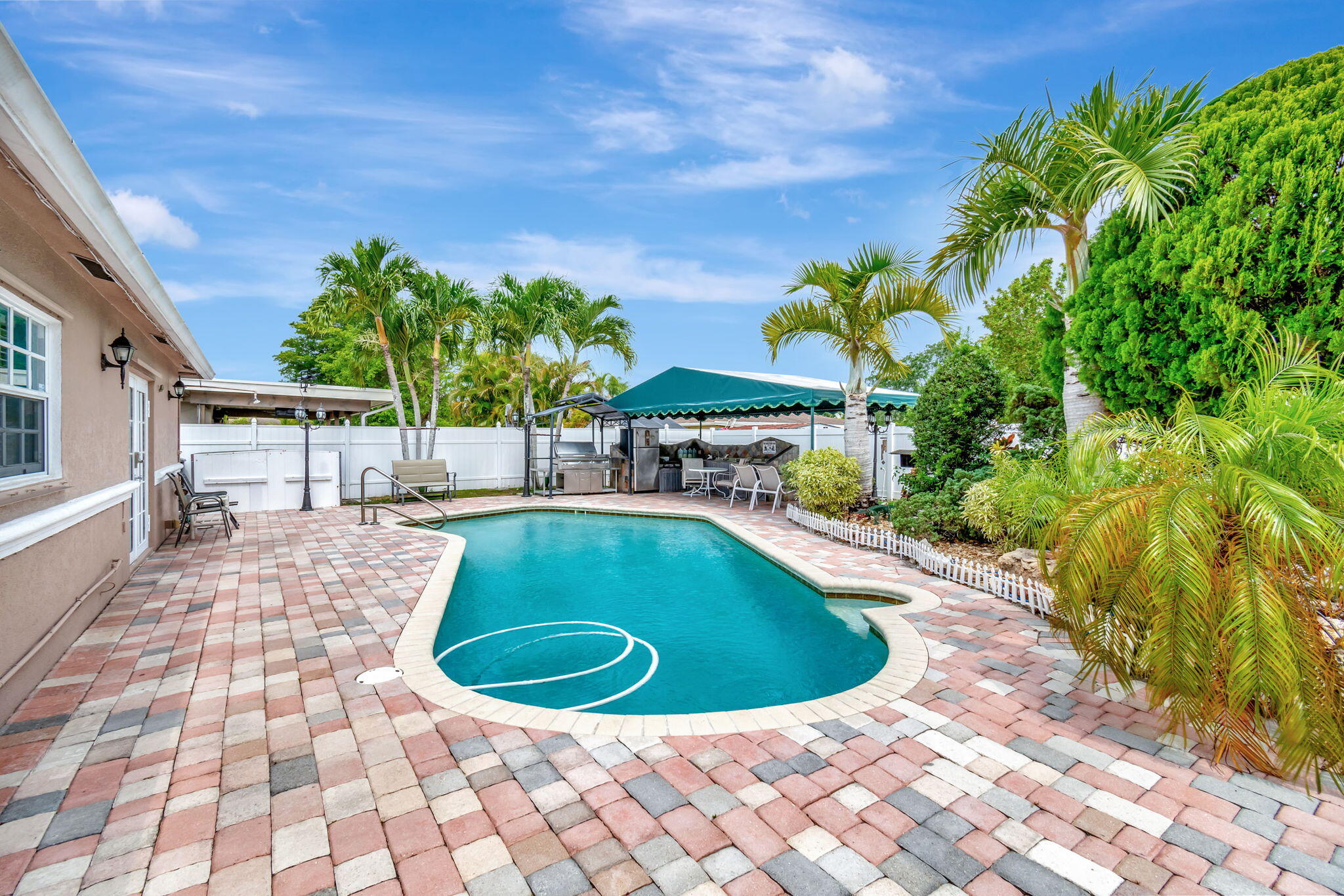 4557 Avalon Street Boca Raton, FL 33428 - Photo 37 of 47 a view of outdoor space yard and patio