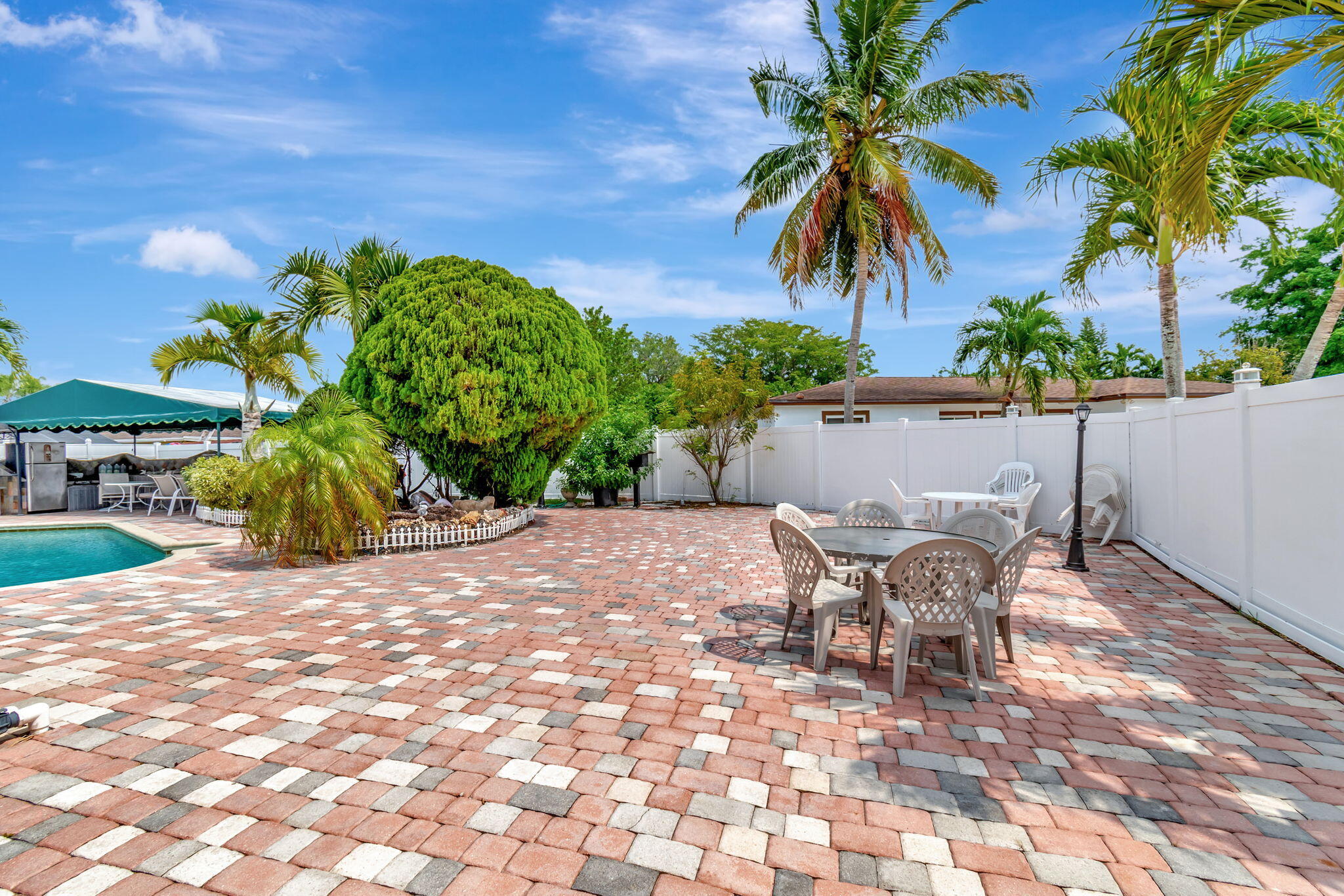 4557 Avalon Street Boca Raton, FL 33428 - Photo 39 of 47 a view of an outdoor space with porch