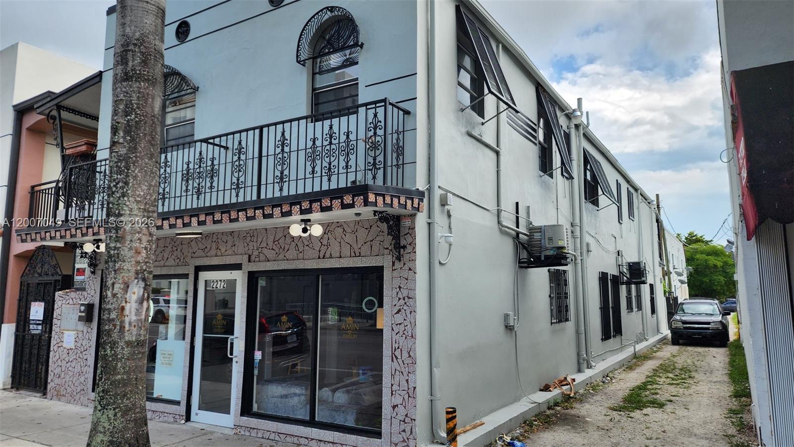 2272 Southwest 8th Street, Unit 3 Miami, FL 33135 - Photo 2 of 23 a view of a house with street