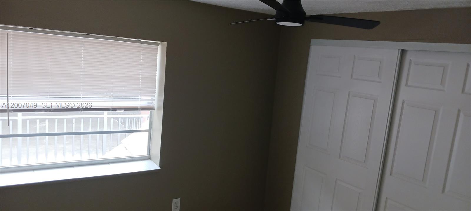 2272 Southwest 8th Street, Unit 3 Miami, FL 33135 - Photo 22 of 23 a view of a room that has a window in it