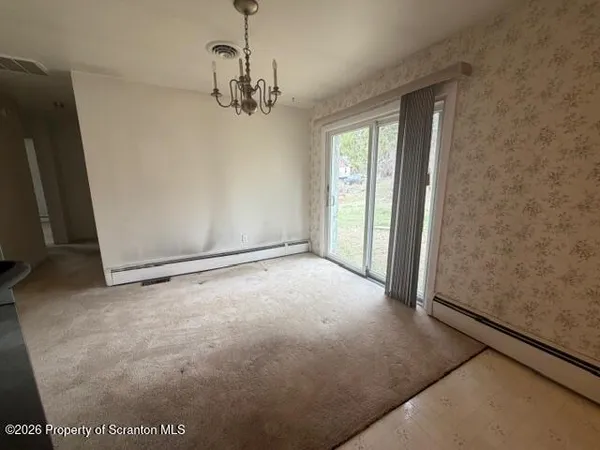 a view of a livingroom with a chandelier