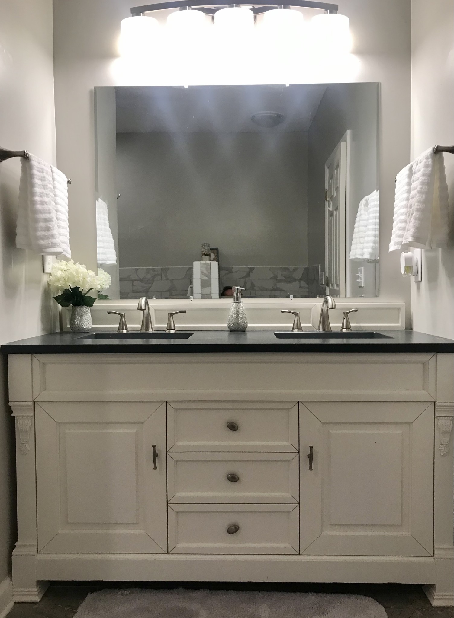 7050 Williams Road Cross Plains, TN 37049 - Photo 21 of 50 a bathroom with a sink vanity and mirror