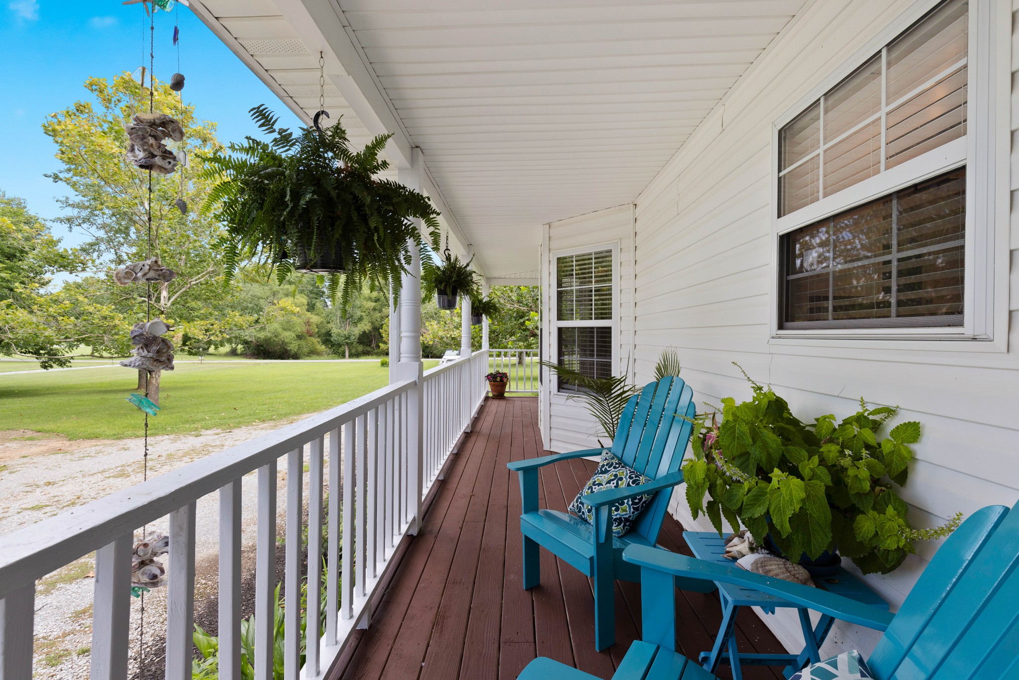 7050 Williams Road Cross Plains, TN 37049 - Photo 30 of 50 a view of a balcony with table and chairs and a barbeque