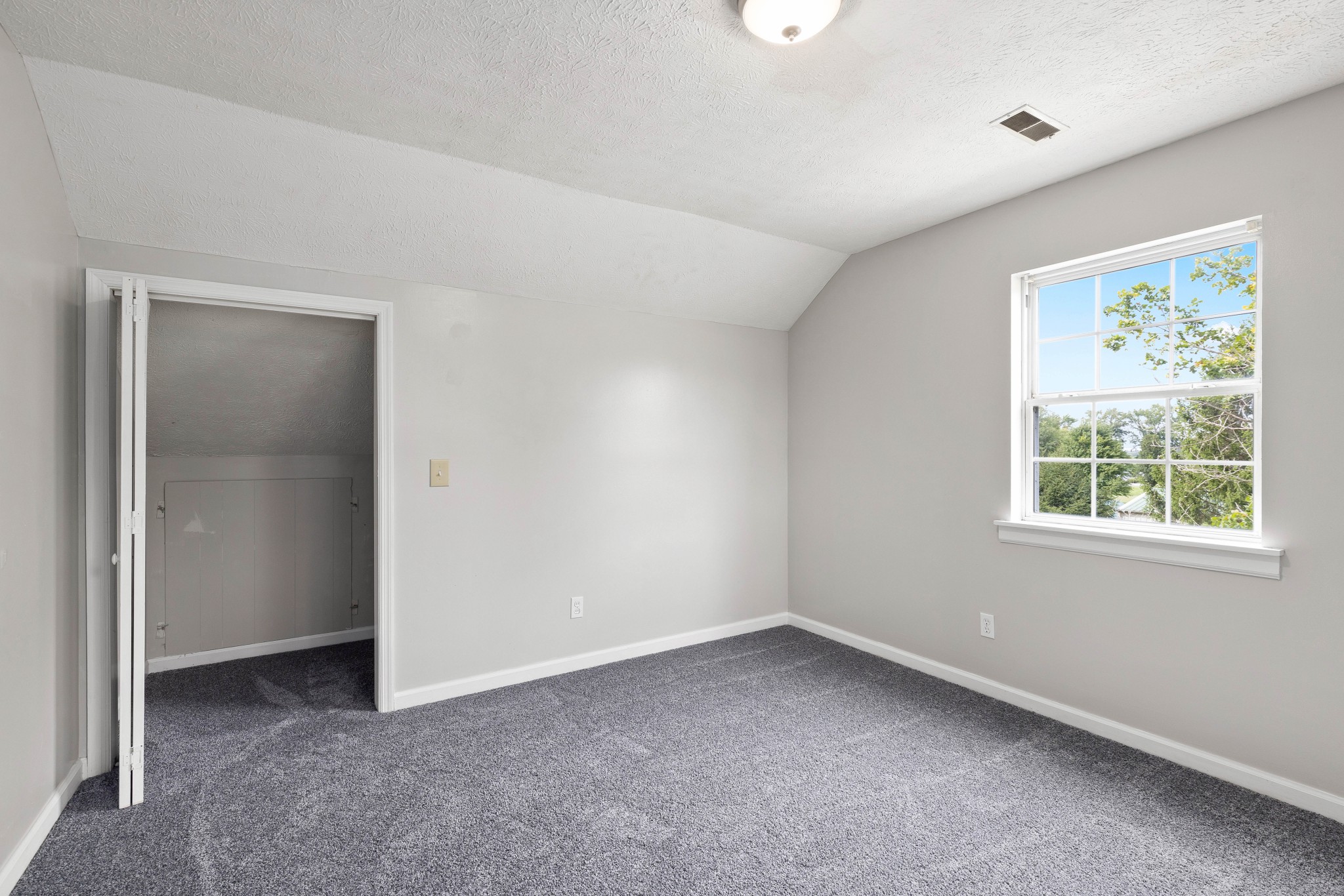 7050 Williams Road Cross Plains, TN 37049 - Photo 31 of 50 an empty room with a window
