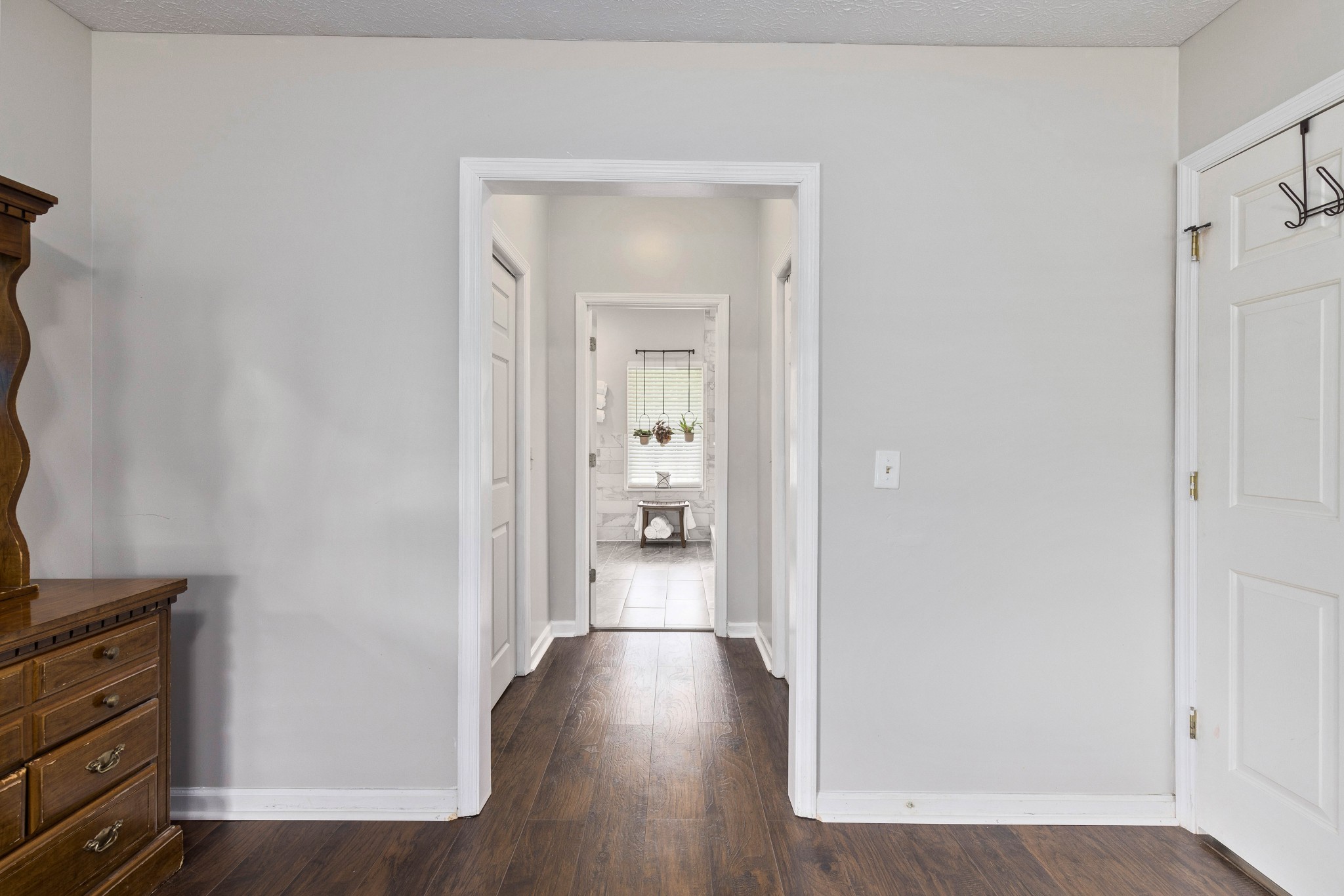 7050 Williams Road Cross Plains, TN 37049 - Photo 39 of 50 a view of a hallway with wooden floor