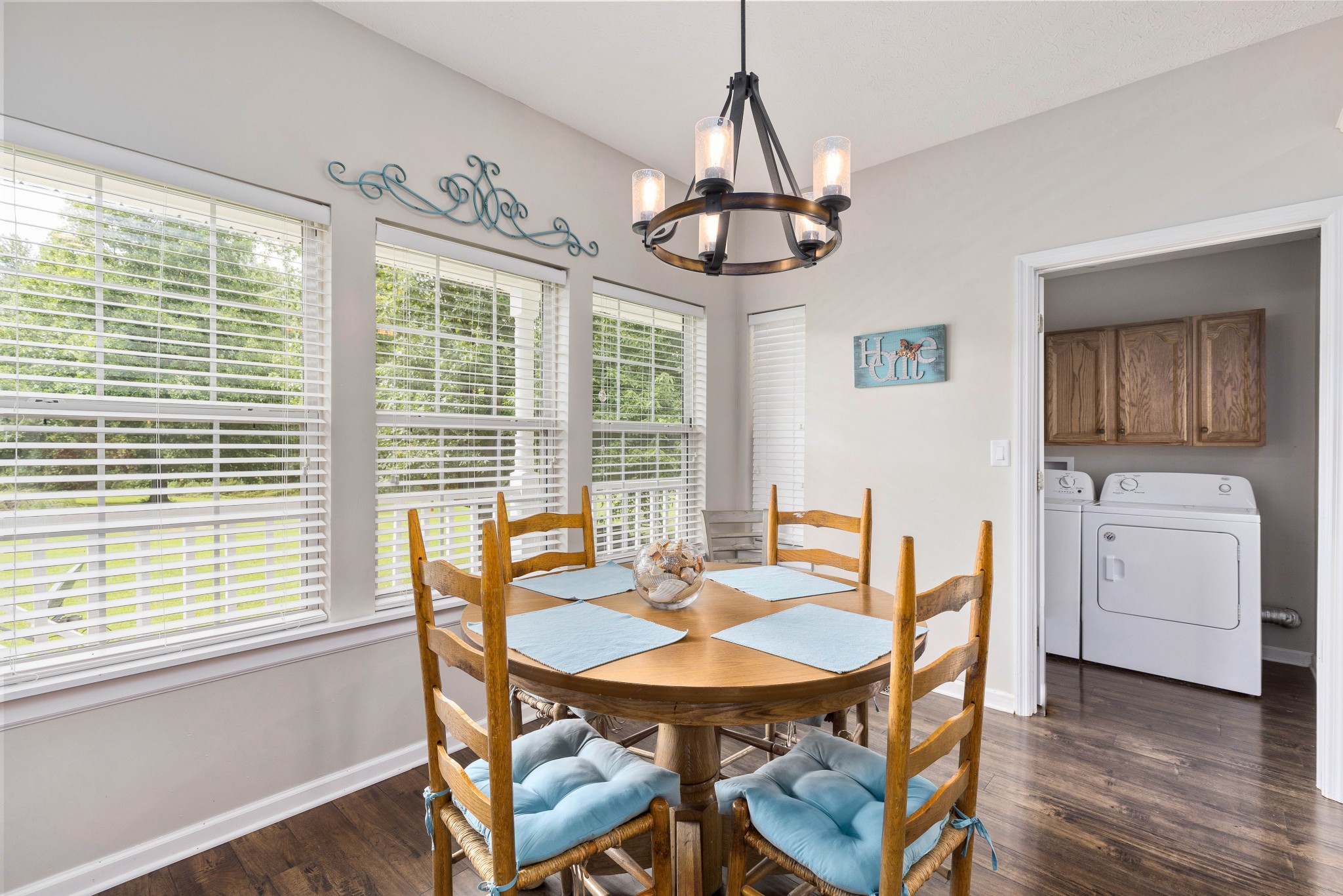 7050 Williams Road Cross Plains, TN 37049 - Photo 46 of 50 a view of a dining room with furniture window and wooden floor